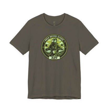 Army green t-shirt with an ADV badge graphic design on a green background