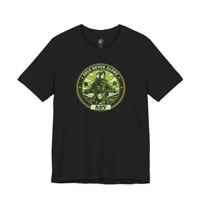 Black t-shirt with a circular graphic design on a green background, ADV badge design