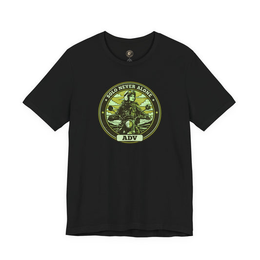 Black t-shirt with a circular graphic design on a green background, ADV badge design