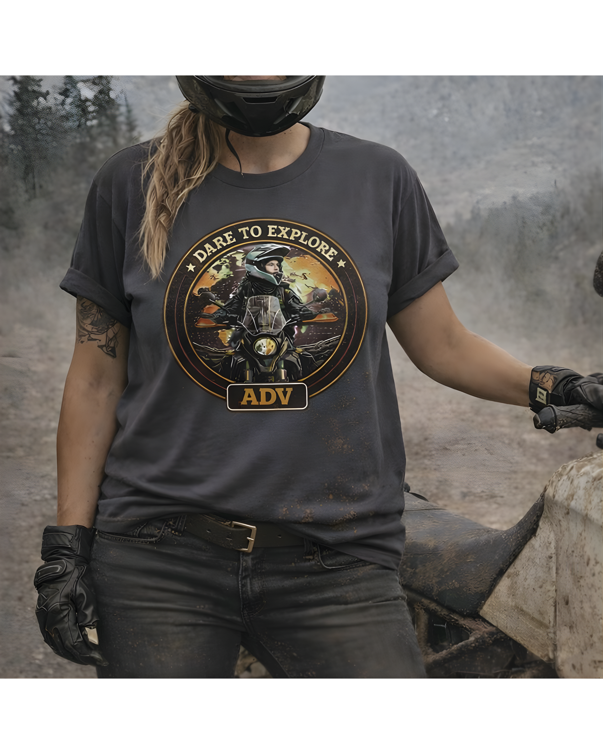Person wearing a t-shirt with a motorcycle graphic and 'Dare to Explore' text, standing next to a motorcycle.